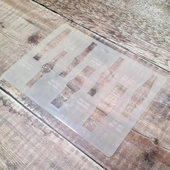 Clear plastic bottle template on a wooden surface