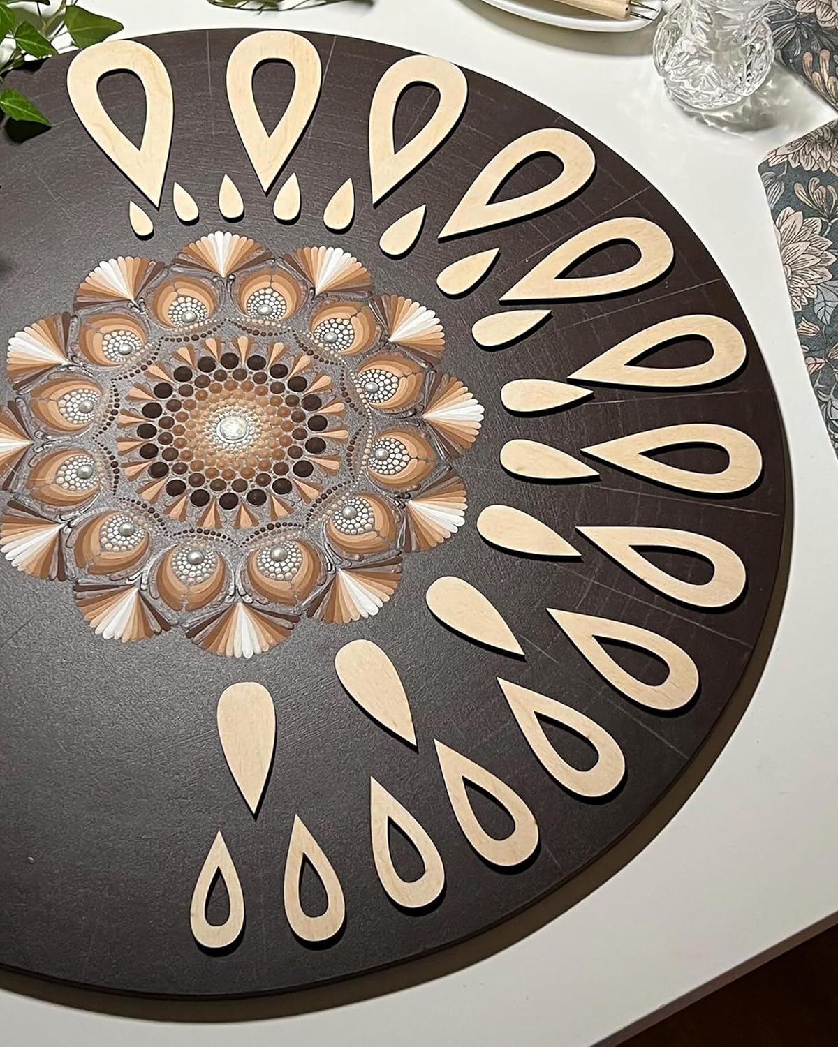 Decorative round mat with geometric pattern on a table