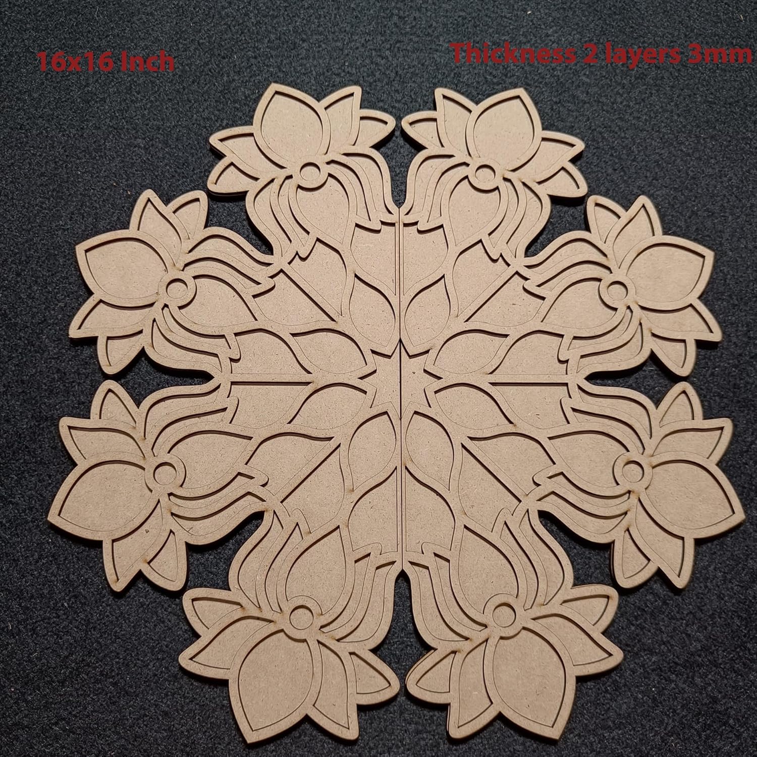 Decorative wooden panel with floral pattern on a black background