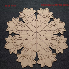 Decorative wooden panel with floral pattern on a black background