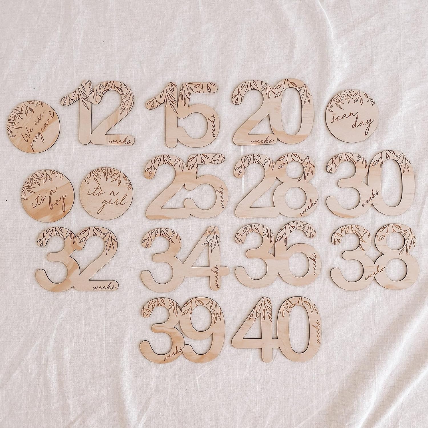 Wooden numbers on a light fabric background