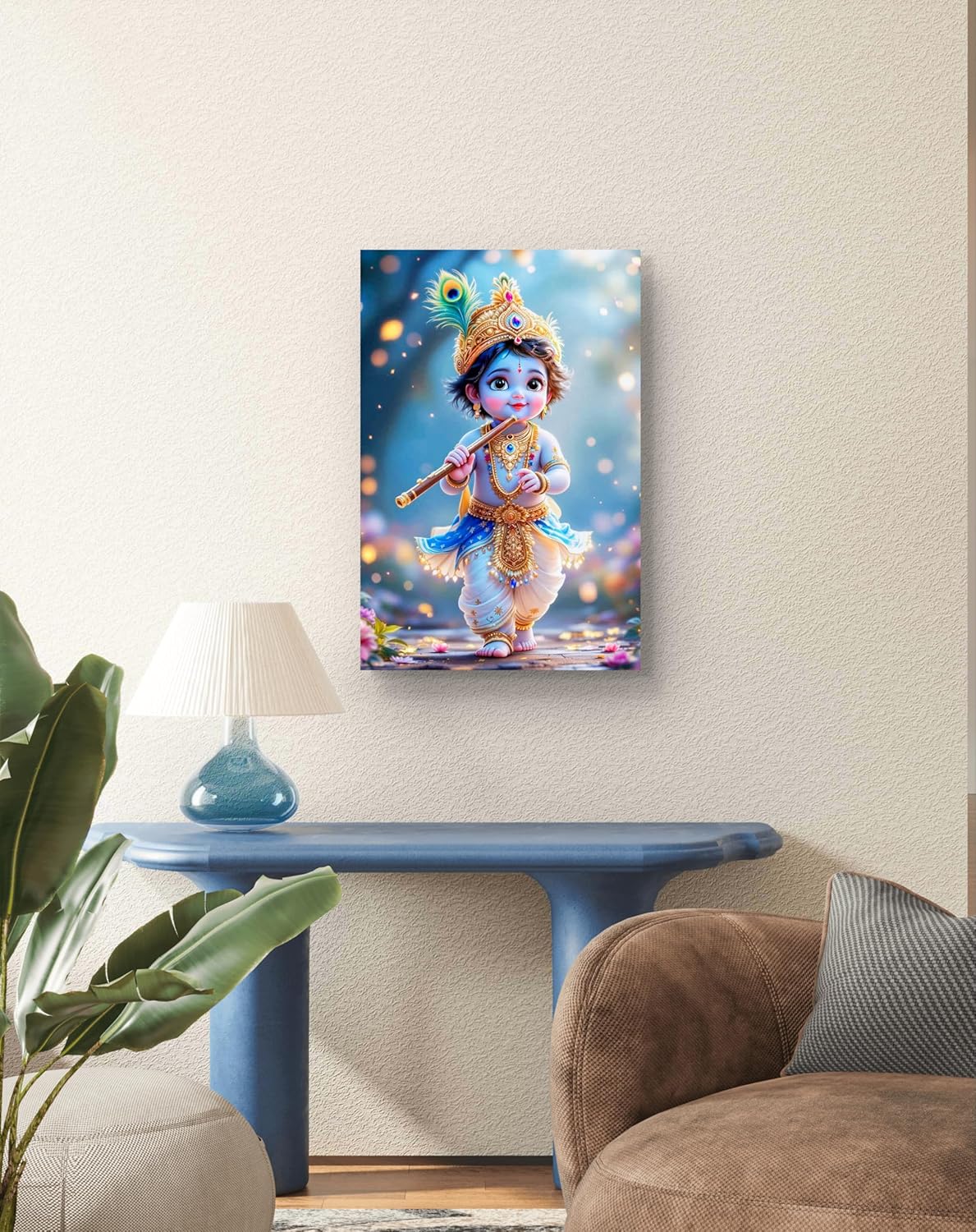 Canvas print of a colorful depiction of a deity on a wall above a table with a lamp.
