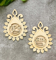 Two decorative wooden pieces with intricate carvings on a gray surface.