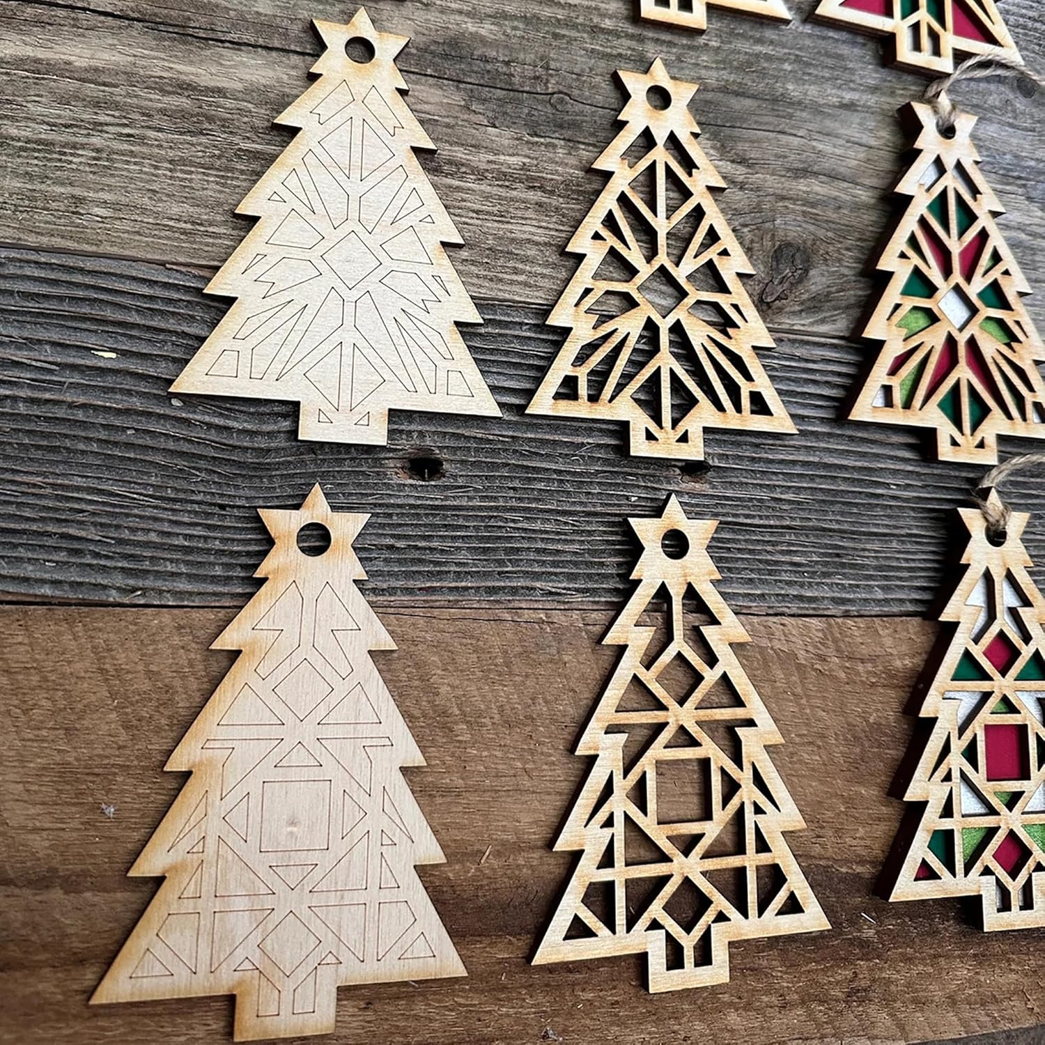 Wooden Christmas tree ornaments on a wooden surface