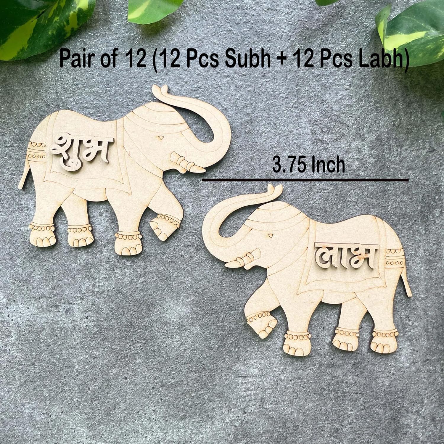 Two elephant-shaped decorations with text on a gray background