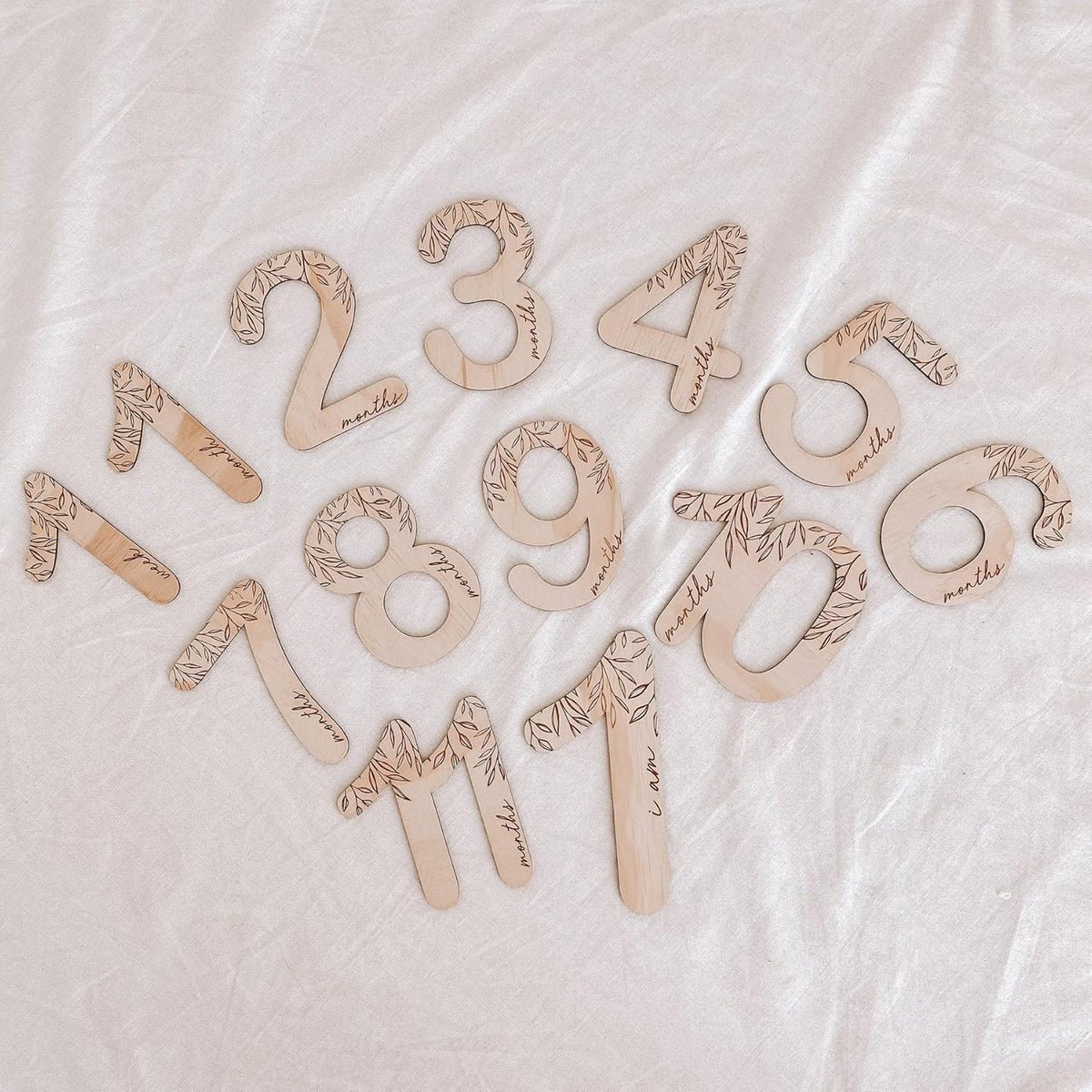Wooden numbers on a textured white background