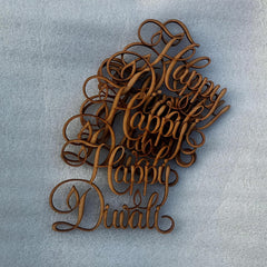 Wooden 'Happy Diwali' decorations on a gray background