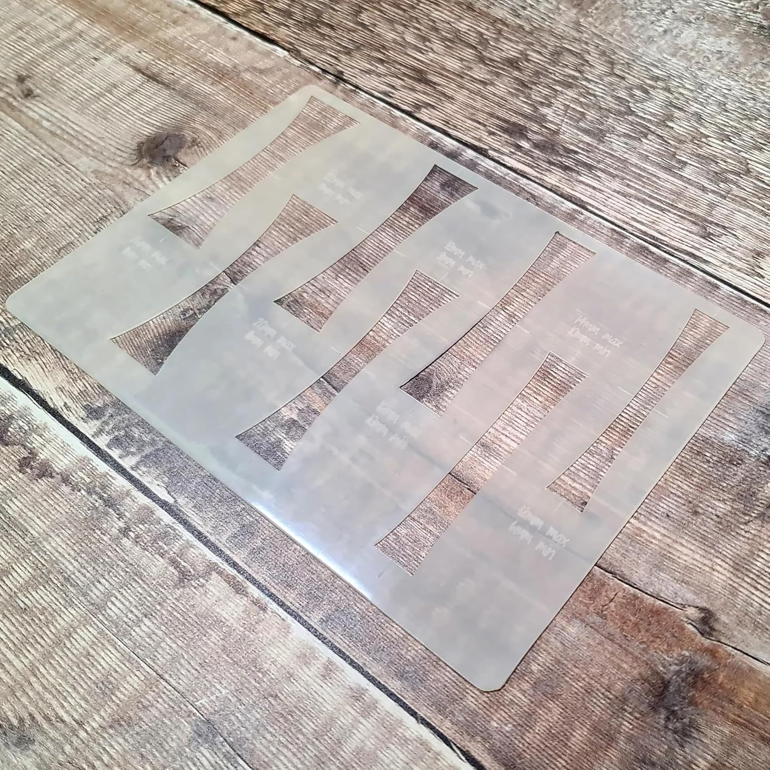 Clear plastic sheet on a wooden surface