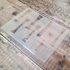 Clear plastic sheet on a wooden surface