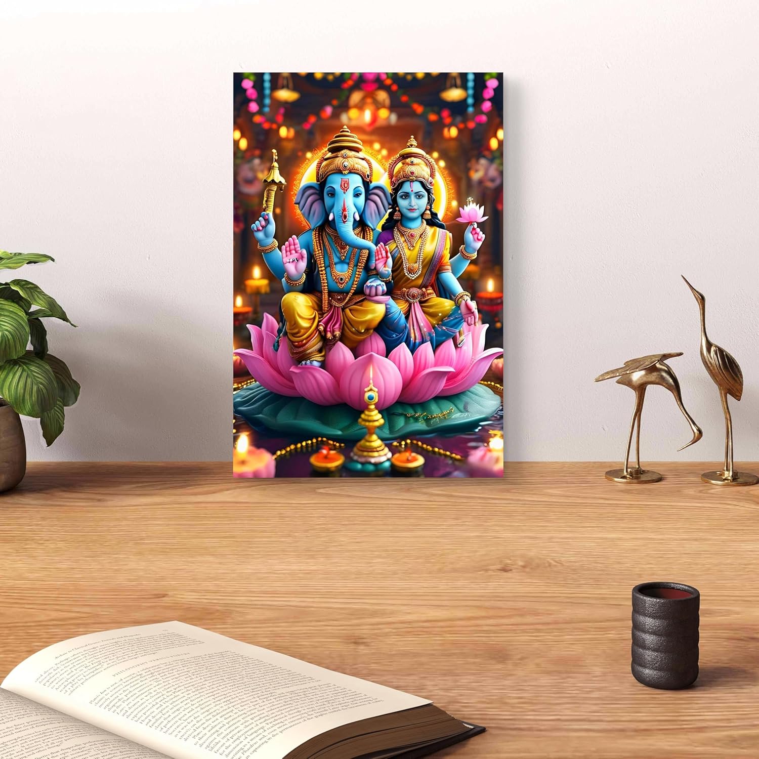 Decorative wall art of two神s on a lotus with colorful lights, placed on a wooden surface with decorative items.