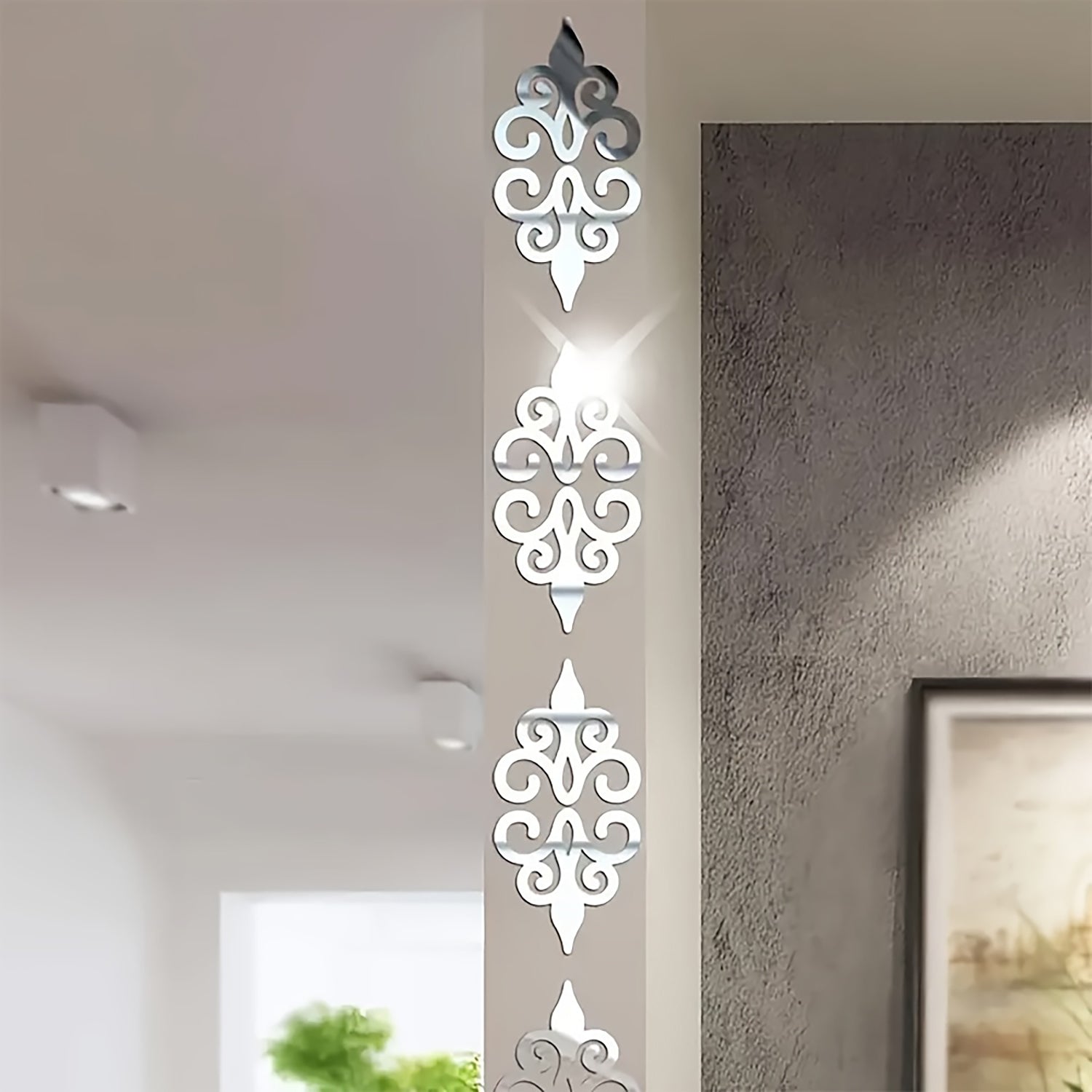 Decorative wall stickers with intricate patterns on a wall.