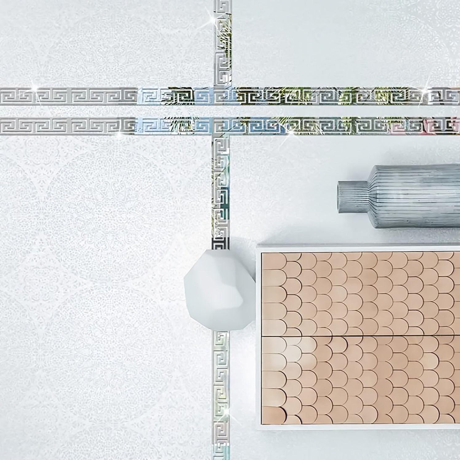 Decorative tile border with geometric pattern on a tiled wall.