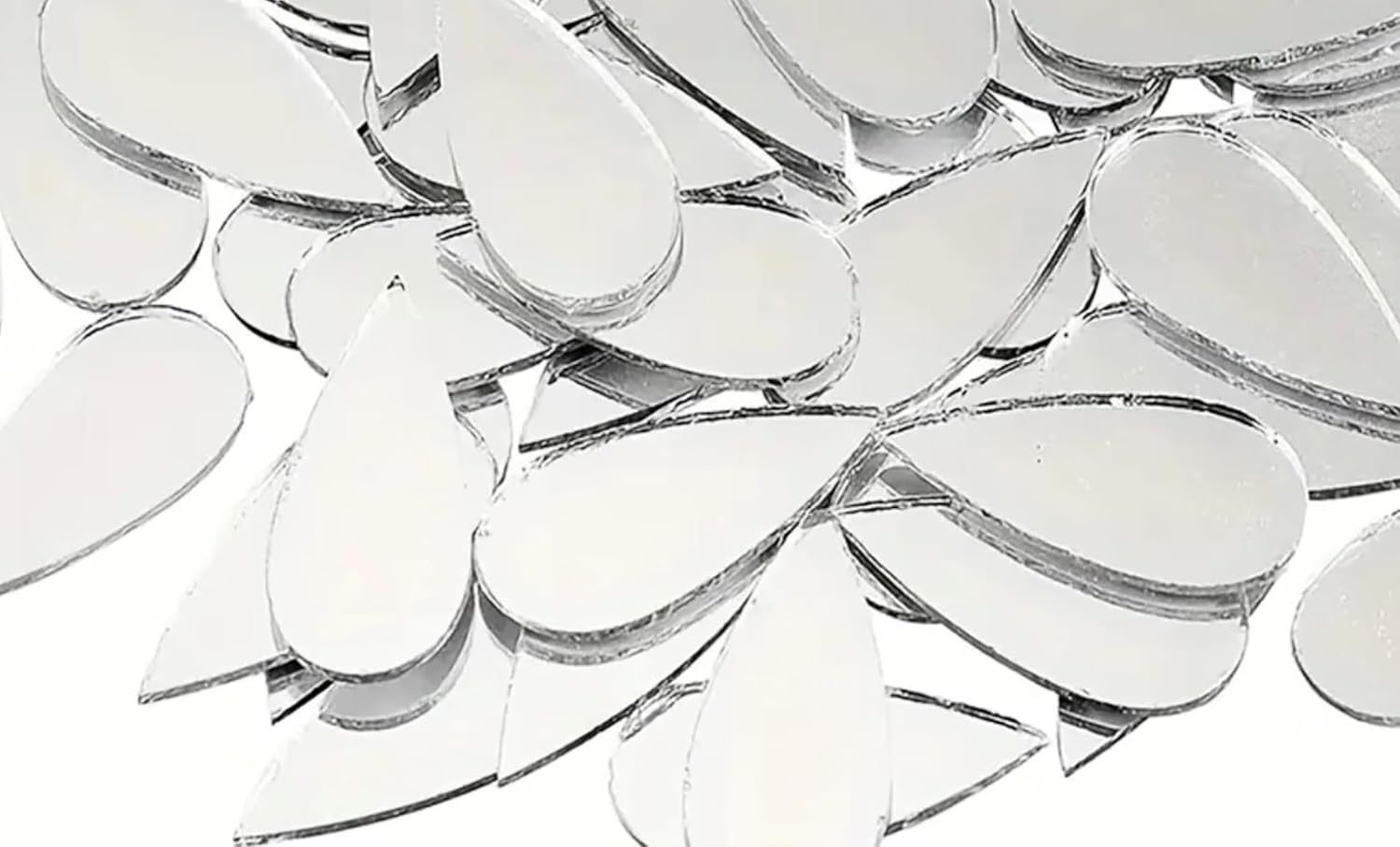 Close-up of a clear glass chandelier with reflective surface