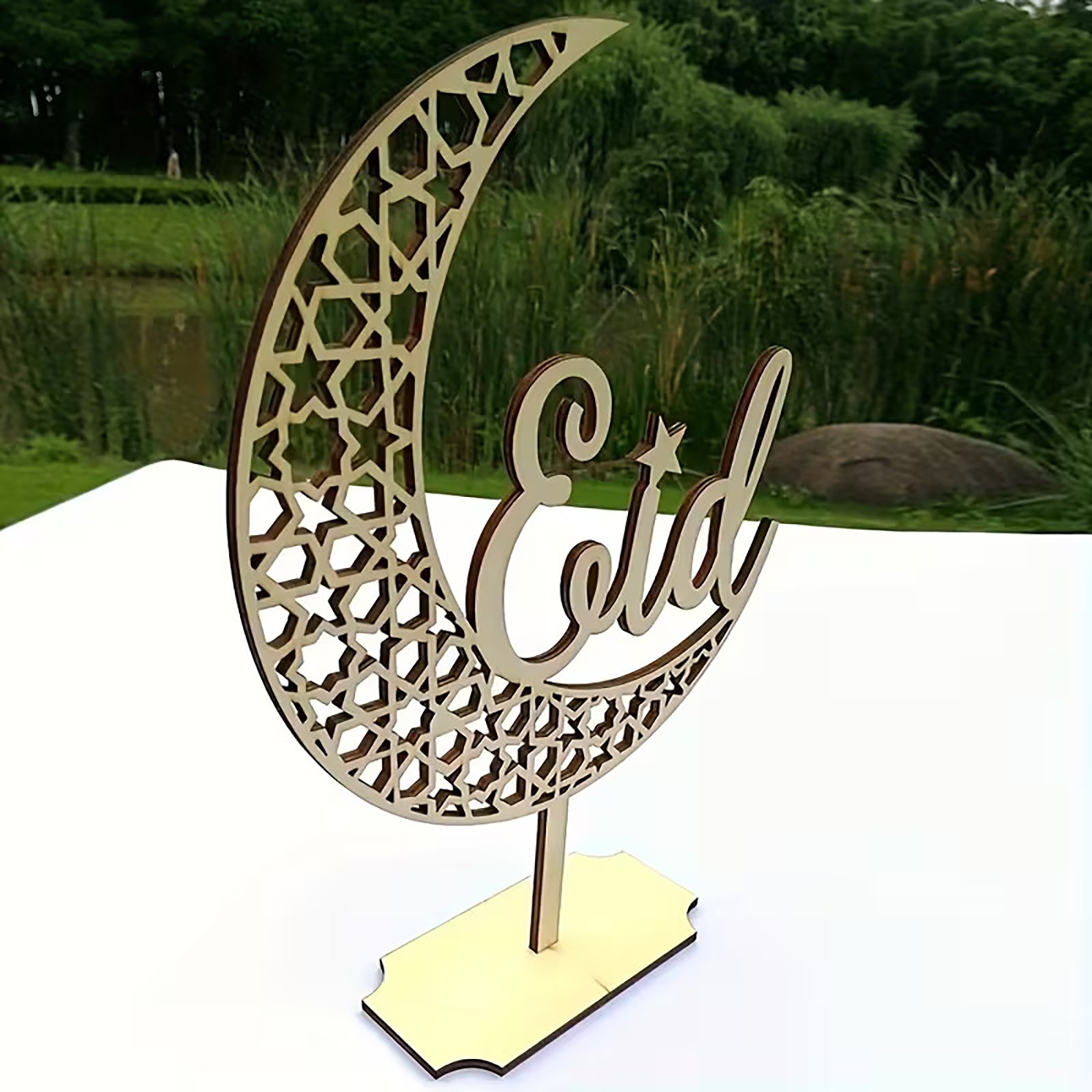 This wooden table decor features an elegant crescent moon shape