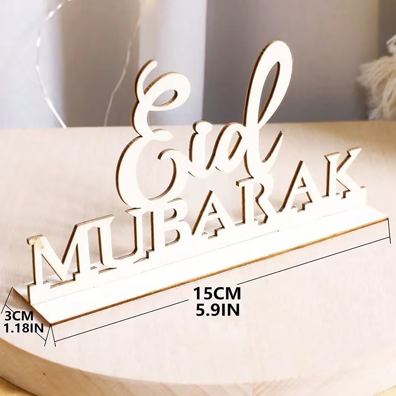 wooden eid mubarak sign
