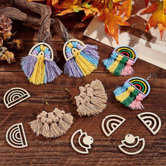 Colorful tassel earrings and decorative items on a wooden surface with autumn leaves.