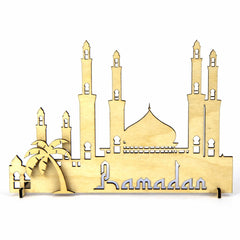 Decorative metal sculpture of a mosque with 'Ramadan' text on a white background