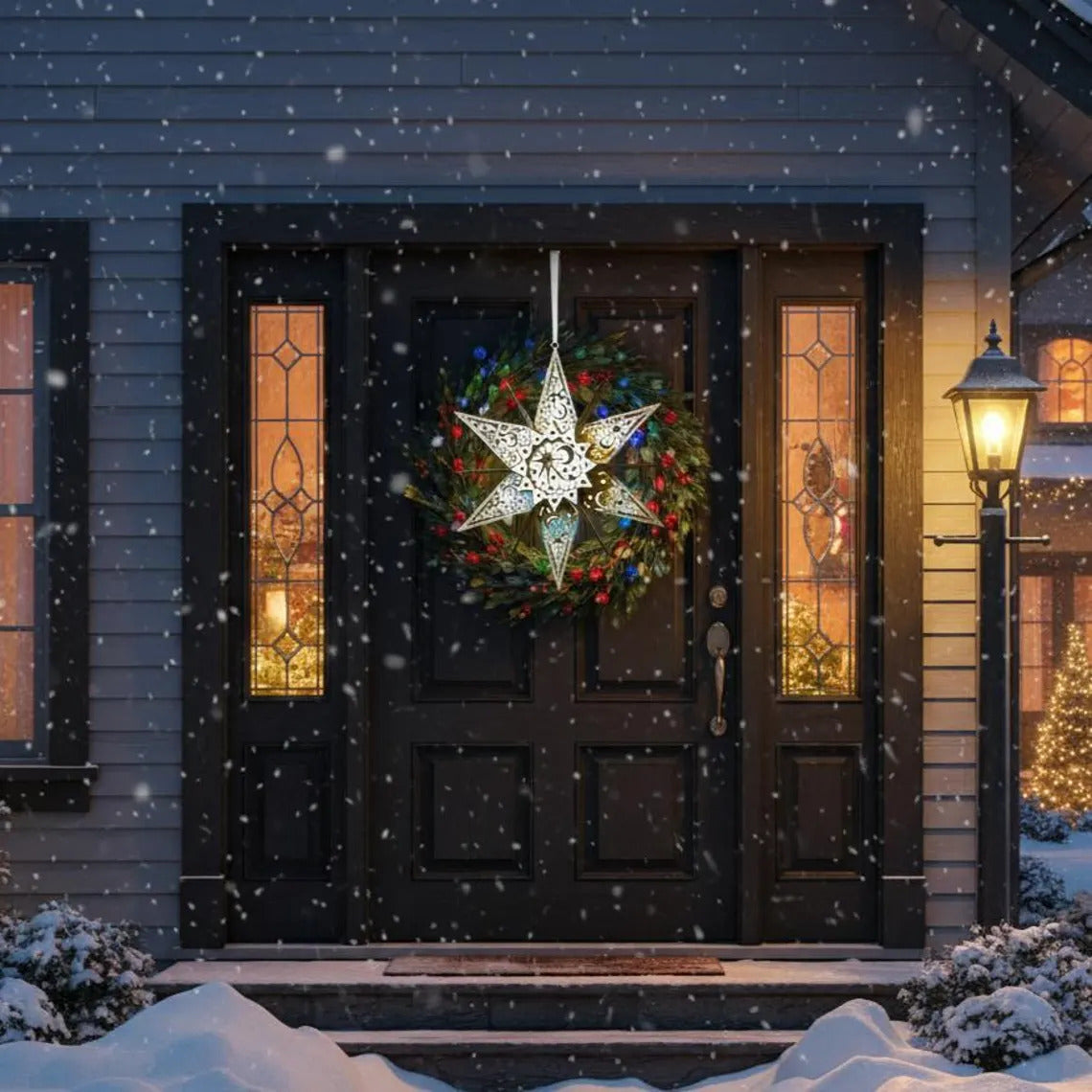 Decorative wreath with a star hanging on a front door during a snowfall