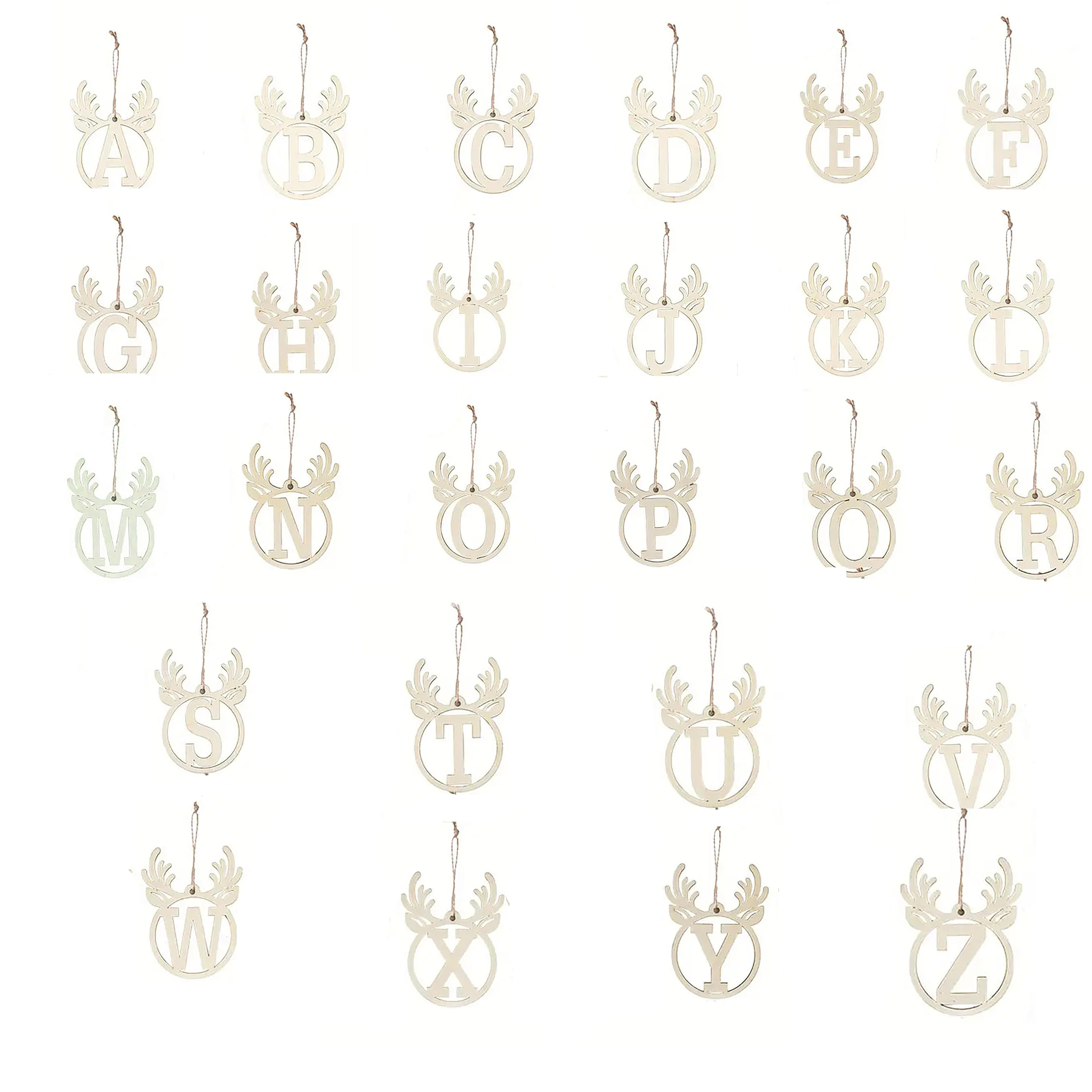 Set of decorative letters with deer antlers on a white background