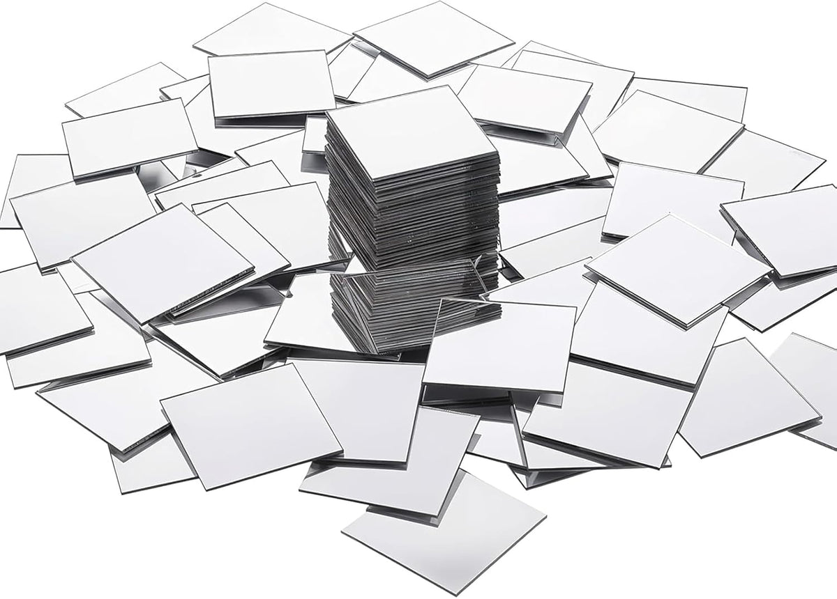 Stack of small square mirrors on a white background