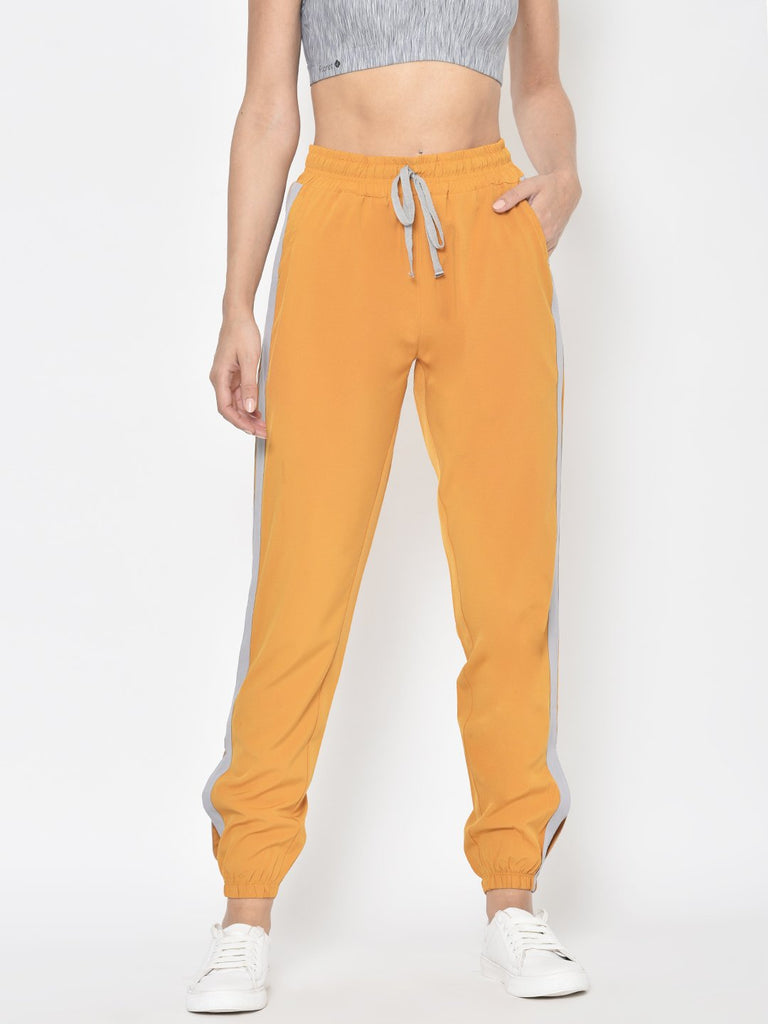 Trackpants: Buy Women Yellow Polyester Trackpants on Cliths